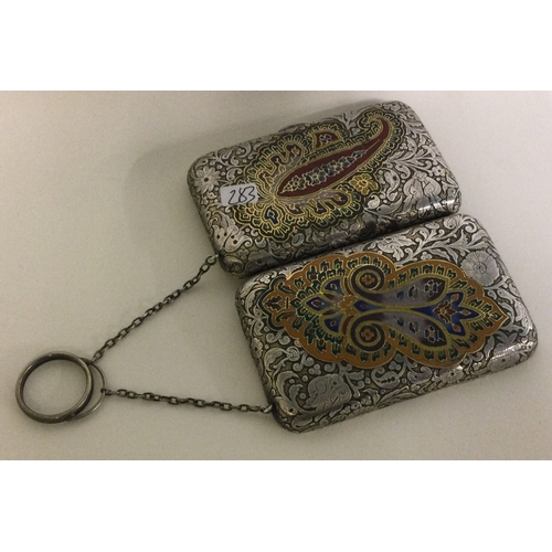 283 - A Continental silver and enamelled purse with suspension chain. Approx. 107 grams. Est. £200 - £300.