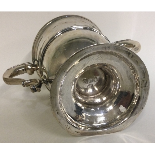 286 - An 18th Century silver two handled cup. London 1777. By William Cattell. Approx. 411 grams. Est. £50... 