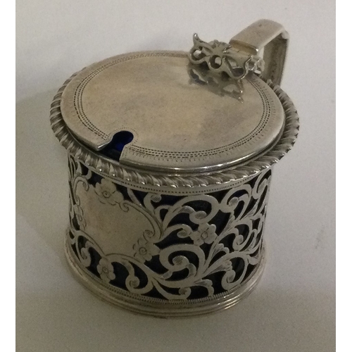 346 - CHESTER: A pierced silver mustard pot. 1901. Approx. 75 grams. Est. £40 - £60.