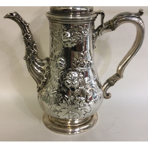 370 - PAUL STORR: A good chased silver coffee pot of typical form. Marked to side. London 1824. Approx. 99... 