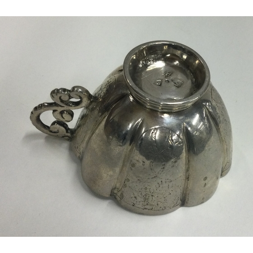 38 - A Continental 18th Century silver Charka / vodka tot. Approx. 59 grams. Est. £200 - £300.