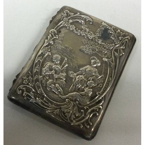 395 - A chased silver embossed card case. London 1901. By William Comyns. Approx. 106 grams. Est. £150 - £... 