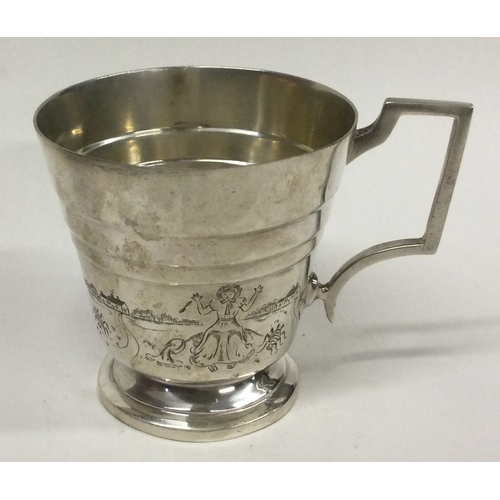 401 - A silver christening mug engraved with nursery rhyme scenes. Birmingham 1931. By Charles S Green & C... 