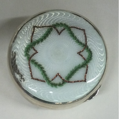 433 - A silver and white enamelled box bearing import marks. Approx. 62 grams. Est. £50 - £80.