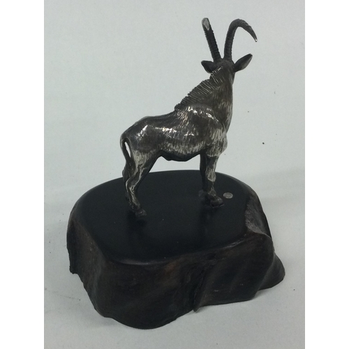 440 - PATRICK MAVROS: A silver figure of an antelope on stand. Approx. 156 grams. Est. £200 - £300.