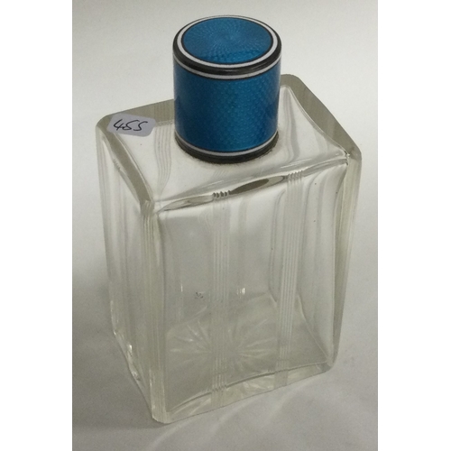 455 - A silver and blue enamelled glass scent bottle. Est. £40 - £60.