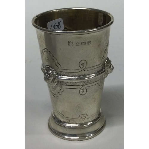 468 - A chased silver beaker embossed with lions. Birmingham 1930. By Barker Brothers Ltd. Approx. 78 gram... 