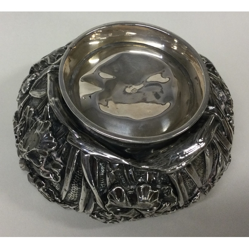 481 - A Japanese silver bowl. Marked to base. Approx. 248 grams. Est. £150 - £200.