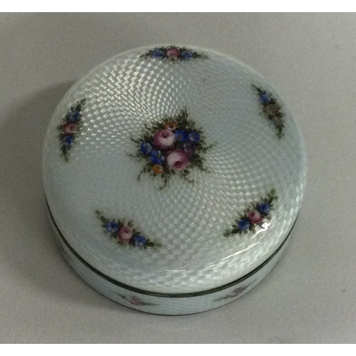 484 - A silver and white enamelled box engraved with flowers bearing import marks. Marked to interior. App... 