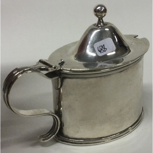 488 - NEWCASTLE: A Georgian silver and glass mustard pot. Circa 1780. By John Langlands & John Robertson. ... 