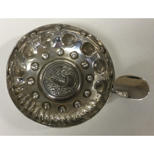 490 - A French silver wine taster. Approx. 74 grams. Est. £60 - £80.