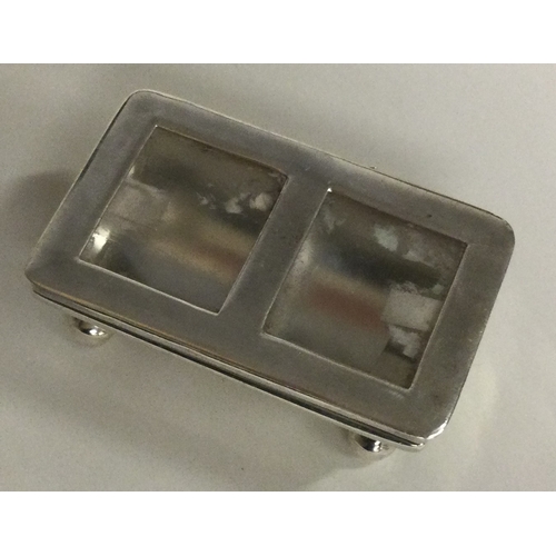 510 - A modern silver and glass stamp box. Approx. 32 grams. Est. £40 - £60.