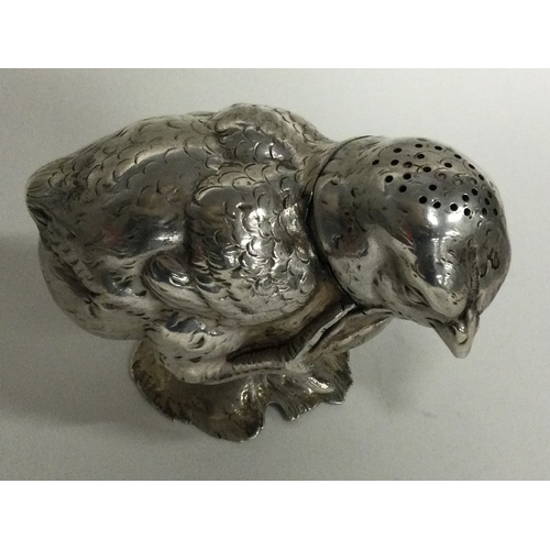 517 - A heavy Victorian silver pepper in the form of a chick. Approx. 146 grams. Est. £400 - £600.