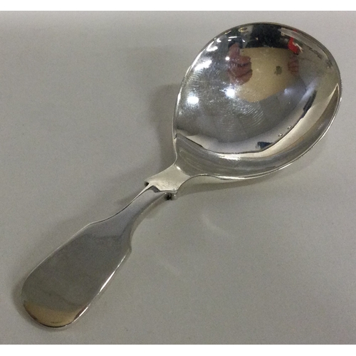 522 - A modernistic silver caddy spoon. Approx. 20 grams. Est. £30 - £50.