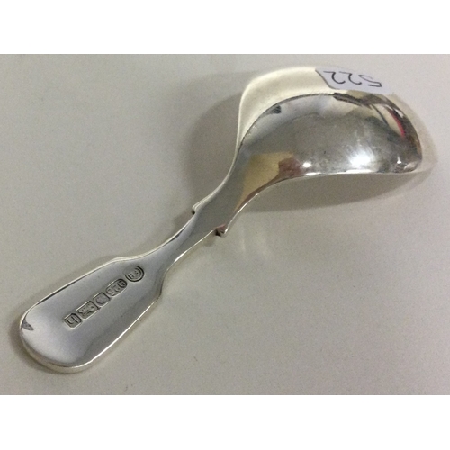 522 - A modernistic silver caddy spoon. Approx. 20 grams. Est. £30 - £50.