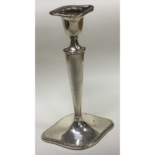 525 - A large silver candlestick. London 1908. By William Hutton & Sons. Approx. 367 grams. Est. £50 - £80... 