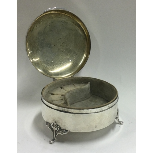 65 - An American silver engraved jewellery / ring box. Marked to base. Approx. 223 grams. Est. £150 - £20... 