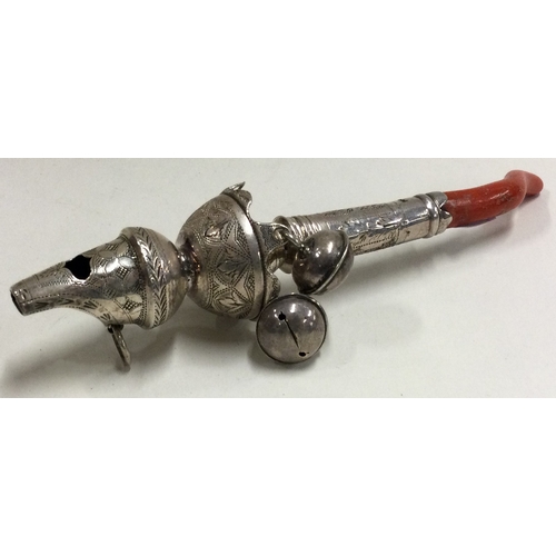 73 - A small Georgian silver rattle with ball decoration. Approx. 36 grams. Est. £50 - £80.