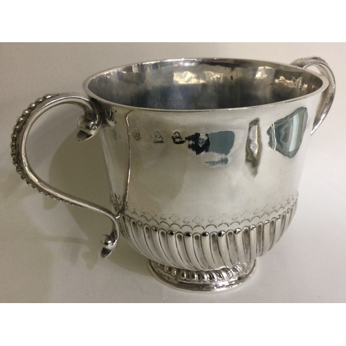 78 - A good early 18th Century silver porringer. London 1713. By Joseph Ward. Approx. 433 grams. Est. £15... 