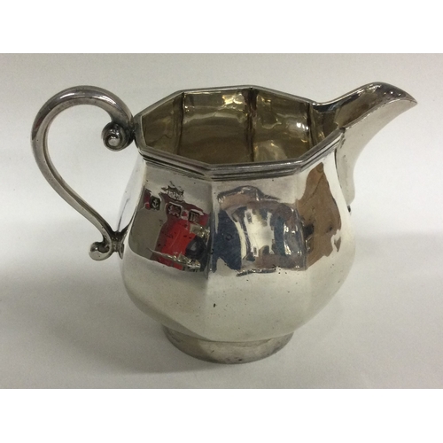 93 - A heavy Georgian style silver cream jug. Birmingham. By Mappin & Webb. Approx. 101 grams. Est. £40 -... 