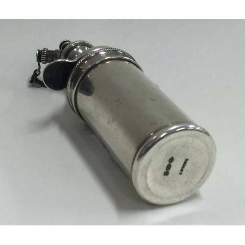 95 - A miniature silver cocktail shaker bearing import marks to base. Approx. 44 grams. Est. £100 - £150.