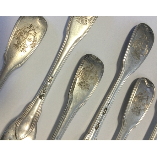 53 - An 18th Century French silver set of crested forks. Approx. 534 grams. Est. £350 - £400.