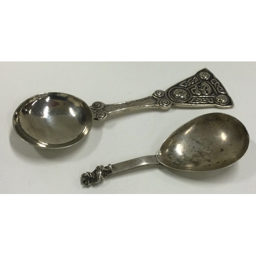 102 - A Lincoln Imp silver caddy spoon, Birmingham 1916, together with an Iona caddy spoon by IMC. Approx.... 