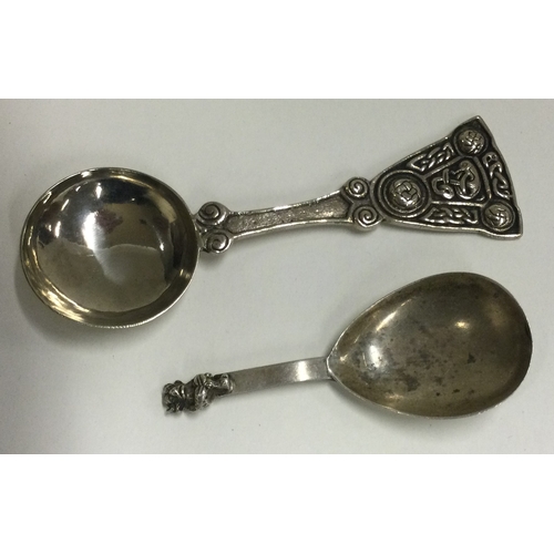 102 - A Lincoln Imp silver caddy spoon, Birmingham 1916, together with an Iona caddy spoon by IMC. Approx.... 