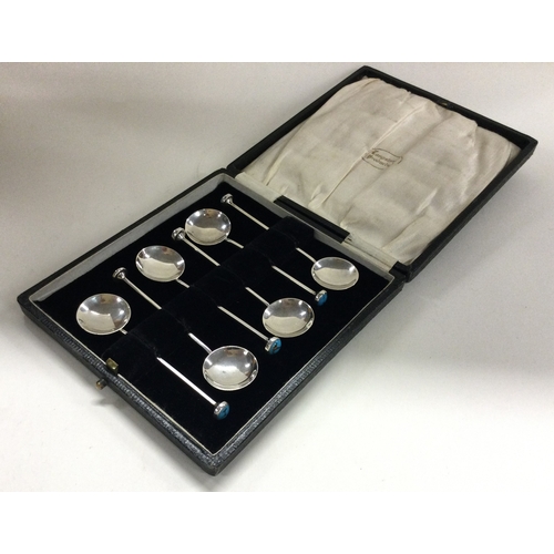 11 - A cased set of six silver and stone set spoons. 1926. By Bernard Instone. Approx. 36 grams. Est. £10... 