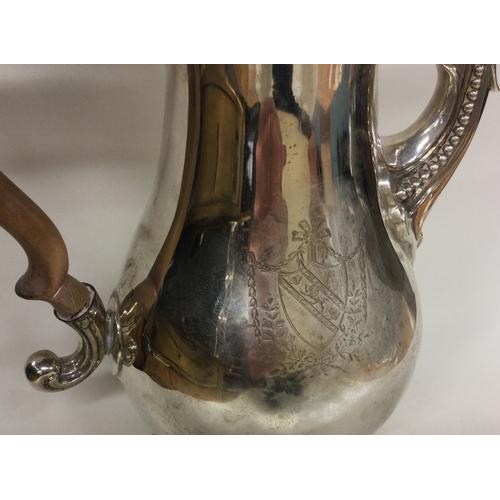 119 - A large Georgian silver coffee pot with central armorial. London 1780. By Charles Wright. Approx. 82... 