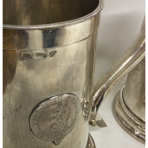 122 - A good pair of Indian Colonial silver pint mugs. Marked 'CK'. Approx. 712 grams. Est. £400 - £600.