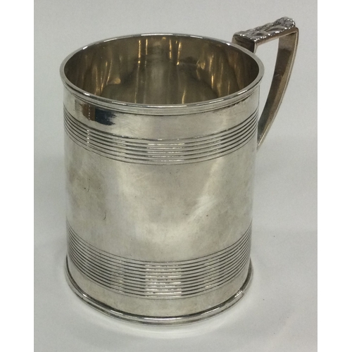 148 - A good Georgian silver reeded mug. London 1813. By Rebecca Emes & Edward Barnard. Approx. 167 grams.... 