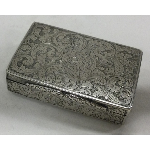 154 - A Victorian silver snuff box with chased decoration bearing inscription, 'Presented as a Small Token... 