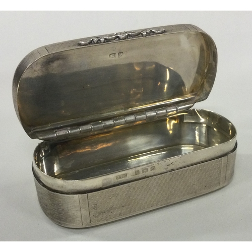 156 - An engine turned silver crested snuff box. Birmingham 1936. By GS Twist. Approx. 109 grams. Est. £20... 