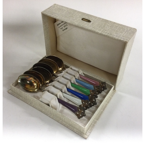 16 - A set of six Norwegian silver and enamelled spoons. Approx. 77 grams. Est. £100 - £150.