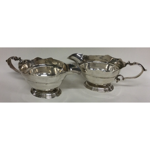 166 - A rare pair of 18th Century Georgian silver sauce boats. London 1729. By William Paradise. Approx. 5... 