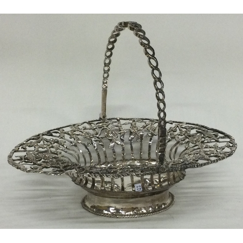 197 - A Georgian silver swing handled basket with pierced decoration. London 1767. Approx. 149 grams. Est.... 