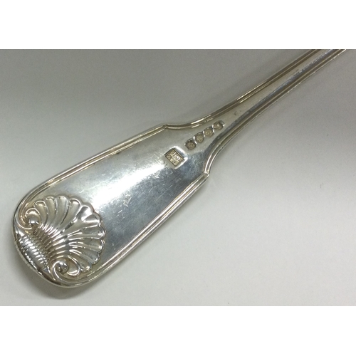 209 - A heavy George III silver fiddle, thread and shell pattern soup ladle. London 1820. By William Eley ... 