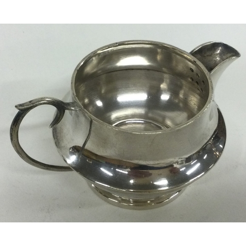 242 - A South American silver jug. Approx. 110 grams. Est. £300 - £500.