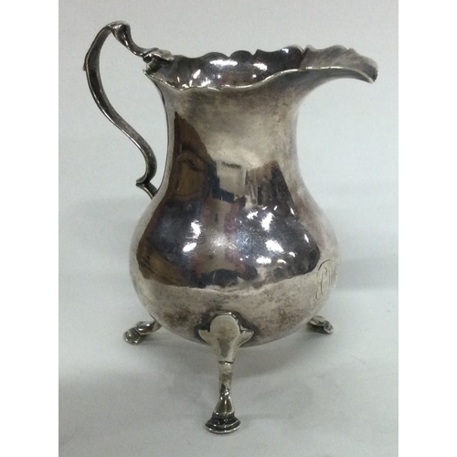 25 - An 18th Century silver jug. London 1764. By Samuel Meriton. Approx. 82 grams. Est. £100 - £150.