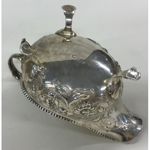 259 - An 18th Century chased silver sauce boat. London 1757. By William Sumner. Approx. 172 grams. Est. £1... 