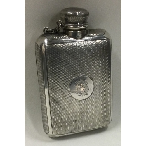 26 - A Victorian silver hip flask. London 1870. By HWL. Approx. 178 grams. Est. £120 - £150.