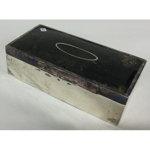 260 - A large silver and tortoiseshell cigar box. Birmingham 1913. Approx. 513 grams of gross weight. Est.... 