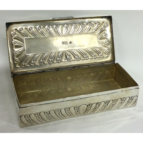 276 - An American silver jewellery box with chased lid. Approx. 218 grams. Est. £100 - £150.