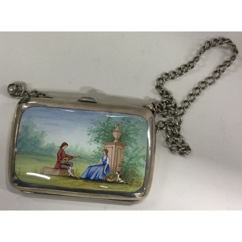 279 - A silver purse decorated with painted musical scene to front. Birmingham. Circa 1910. Approx. 77 gra... 