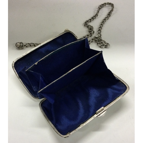 279 - A silver purse decorated with painted musical scene to front. Birmingham. Circa 1910. Approx. 77 gra... 