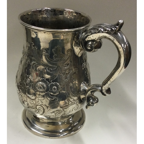 28 - An Indian Colonial silver quart sized mug. Calcutta. Circa 1864. By Charles Nephew & Co. Approx. 823... 