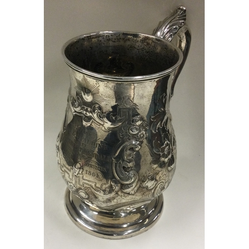 28 - An Indian Colonial silver quart sized mug. Calcutta. Circa 1864. By Charles Nephew & Co. Approx. 823... 