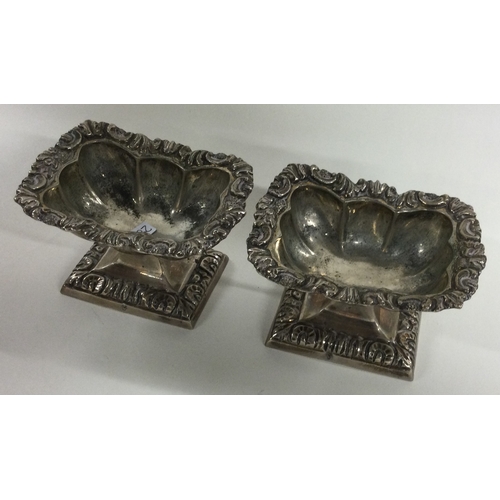 285 - A pair of early 19th Century silver salt cellars bearing control marks to rims. Approx. 217 grams. E... 