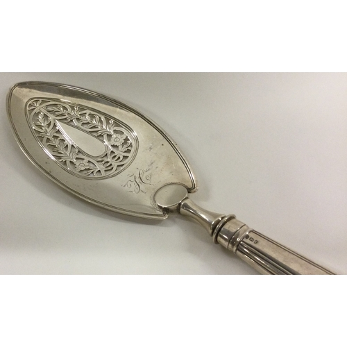 287 - A heavy 18th Century silver fish slice. London 1794. By Michael Plummer. Approx. 159 grams. Est. £12... 